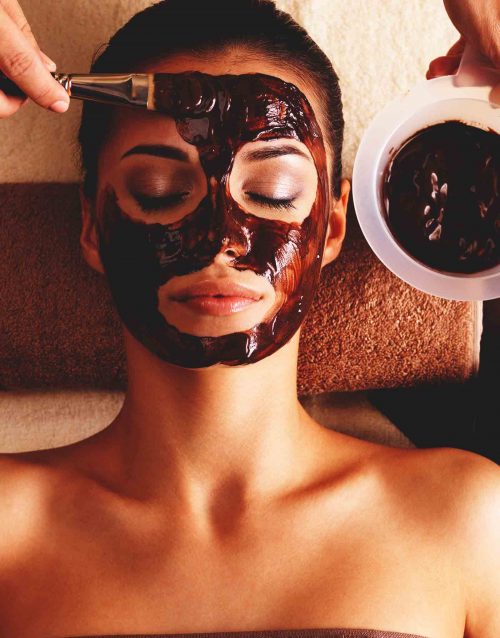 woman with chocolate face mask